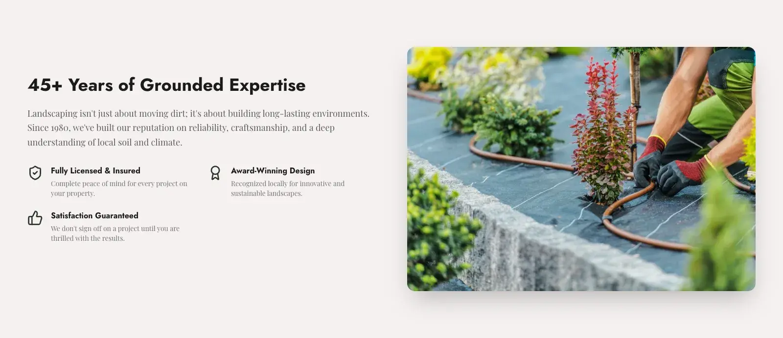 The trust section with the heading 45+ Years of Grounded Expertise, a short paragraph about building reputation since 1980, three trust points with icons (Fully Licensed and Insured, Award-Winning Design, Satisfaction Guaranteed), and a photograph of gloved hands planting a shrub beside drip irrigation.